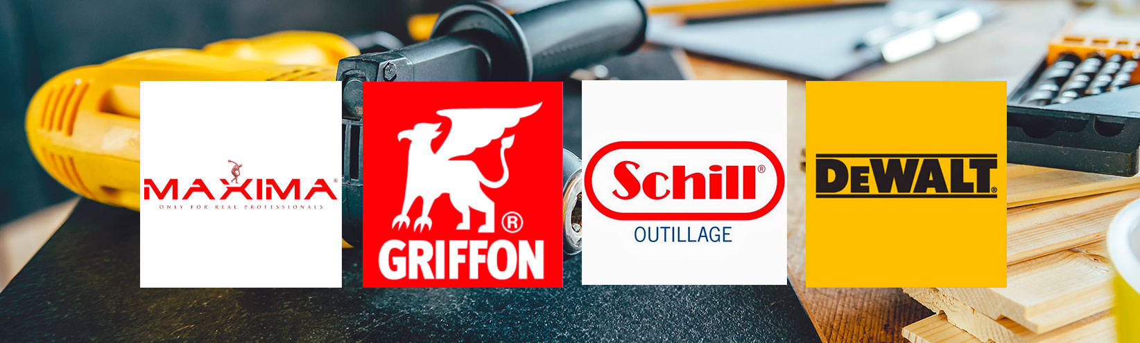 Outillage posé sur une table avec logo Maxima Griffon Schill Dewalt